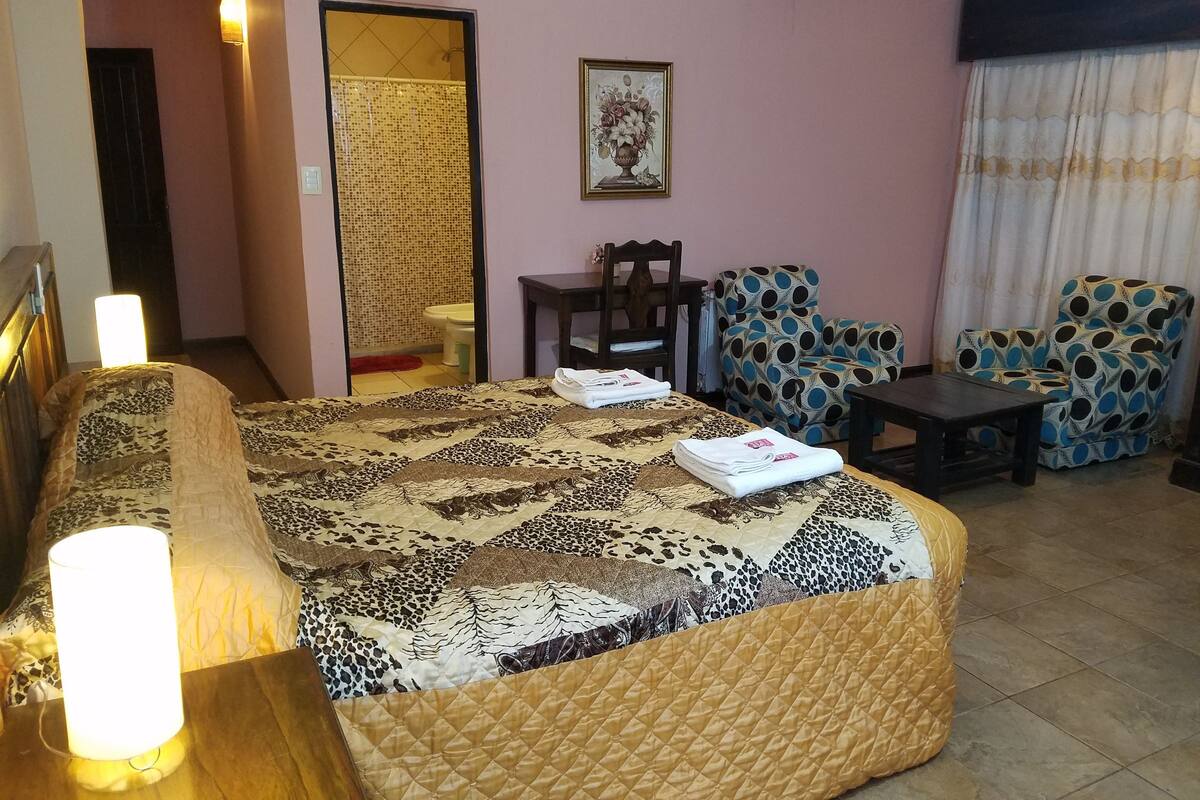 Desk, blackout curtains, iron/ironing board, rollaway beds