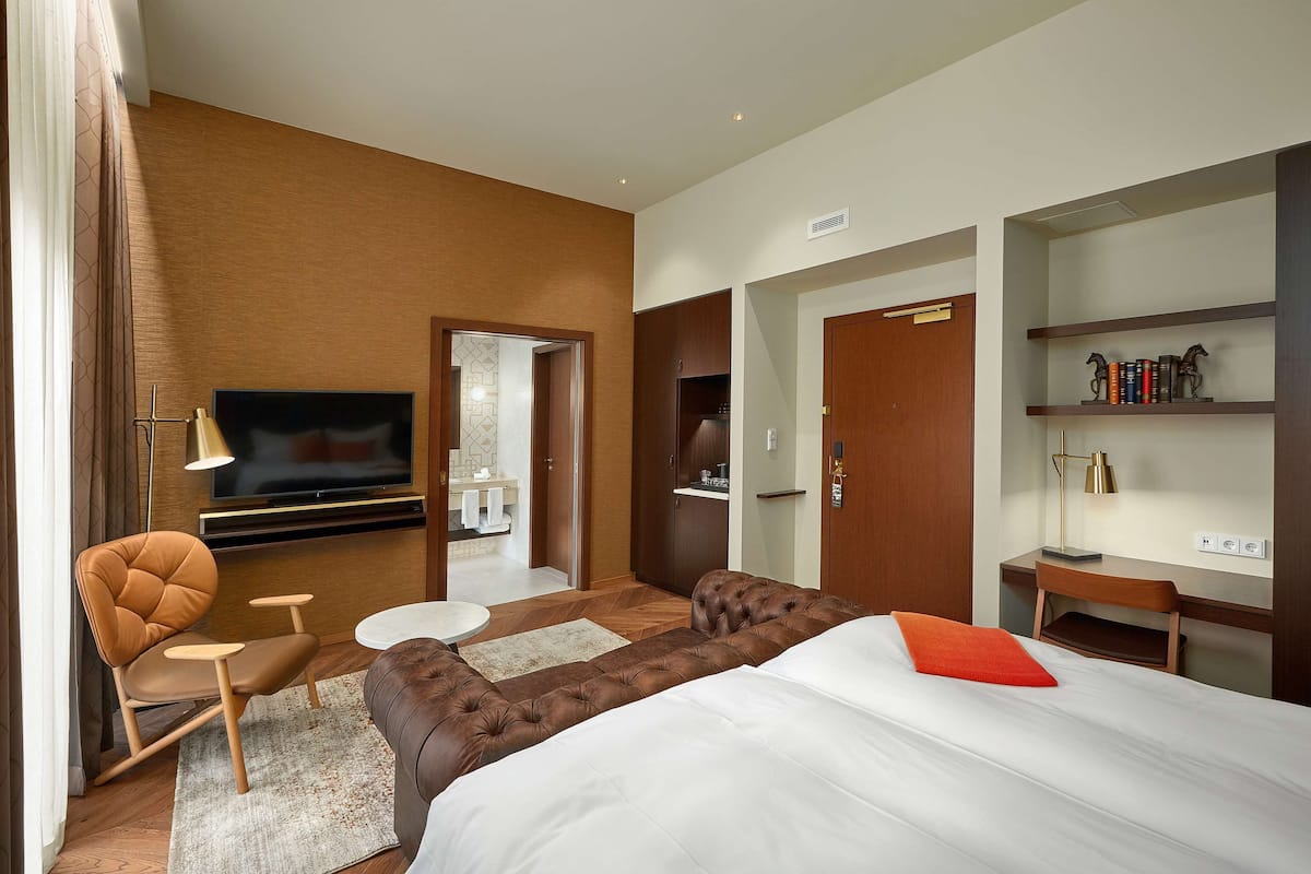 King Deluxe Room | Luxe beddengoed, een minibar met enkele gratis items