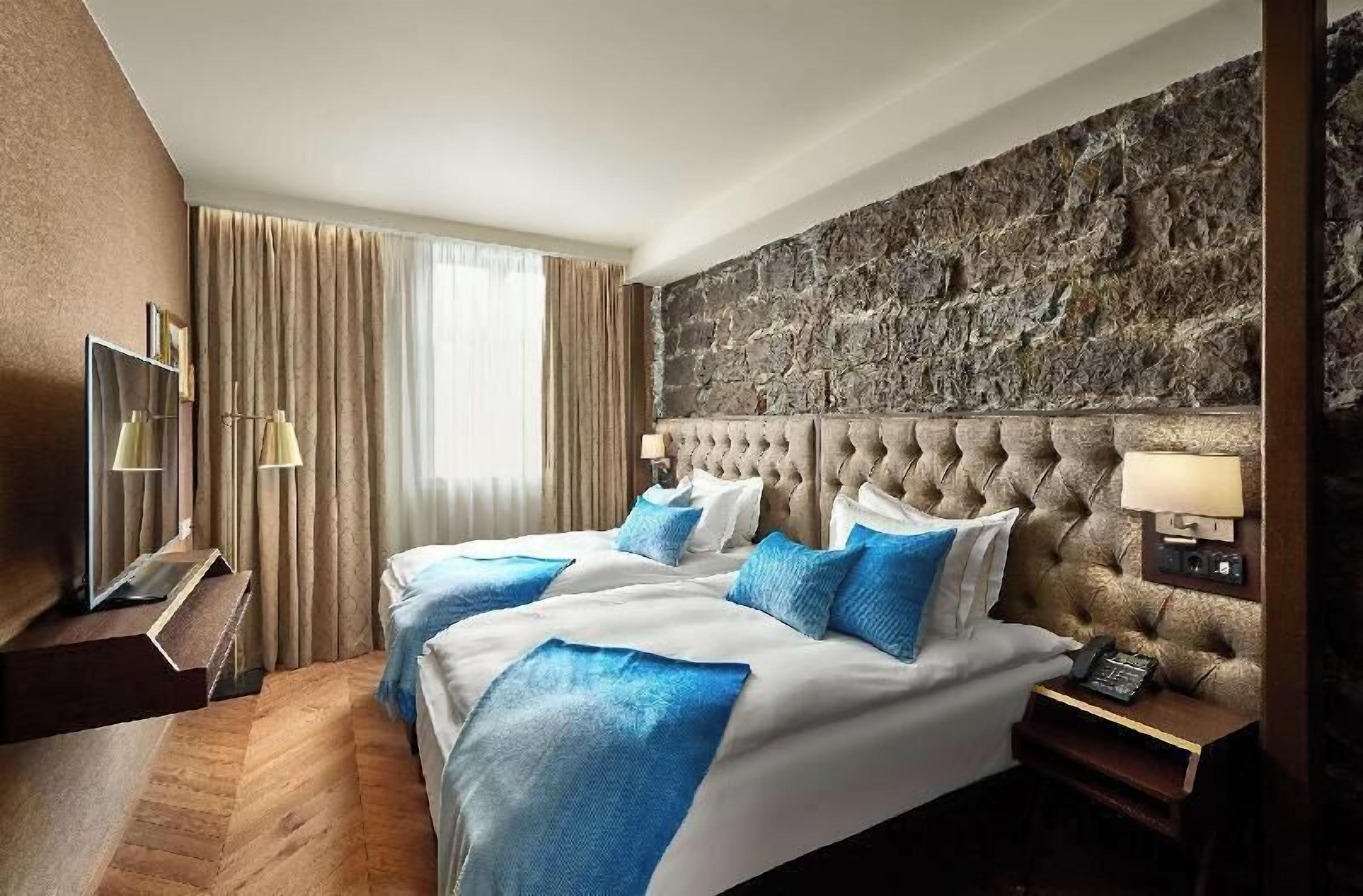 Premium bedding, free minibar items, in-room safe, desk