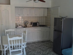 Comfort Apartment, 1 Double Bed, Smoking, Garden View | Private kitchen | Full-size fridge, microwave, stovetop, coffee/tea maker - Condo Carla (Boca Chica)