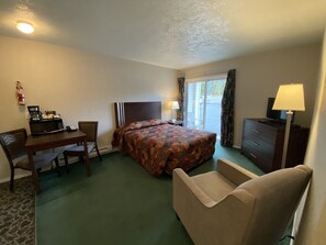 Standard Suite, 2 Queen Beds | Living area | 32-inch flat-screen TV with cable channels, TV - Lake Cowichan Lodge (Lake Cowichan)
