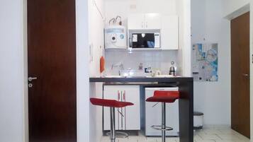 Standard Apartment, Kitchen | Private kitchen | Fridge, stovetop, coffee/tea maker, electric kettle