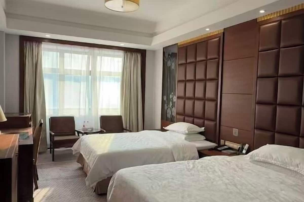 Minibar, desk, blackout drapes, iron/ironing board