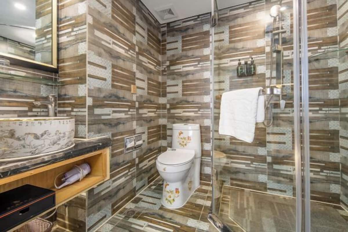 Minibar, desk, blackout curtains, iron/ironing board