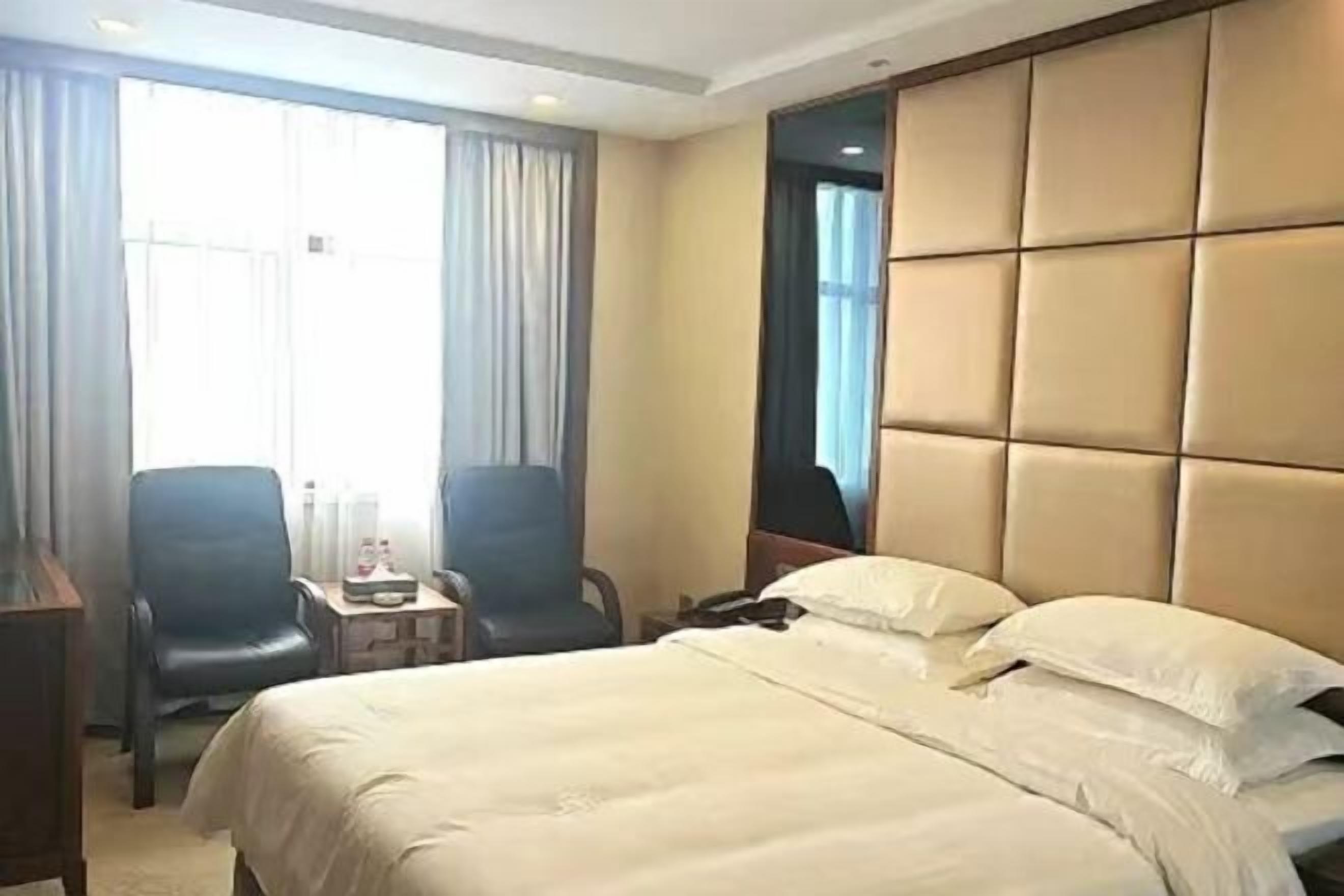 Minibar, desk, blackout drapes, iron/ironing board