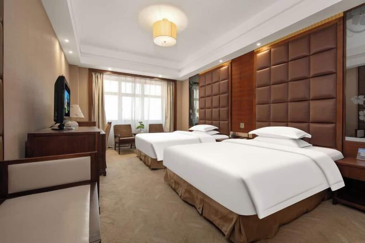 Minibar, desk, blackout curtains, iron/ironing board