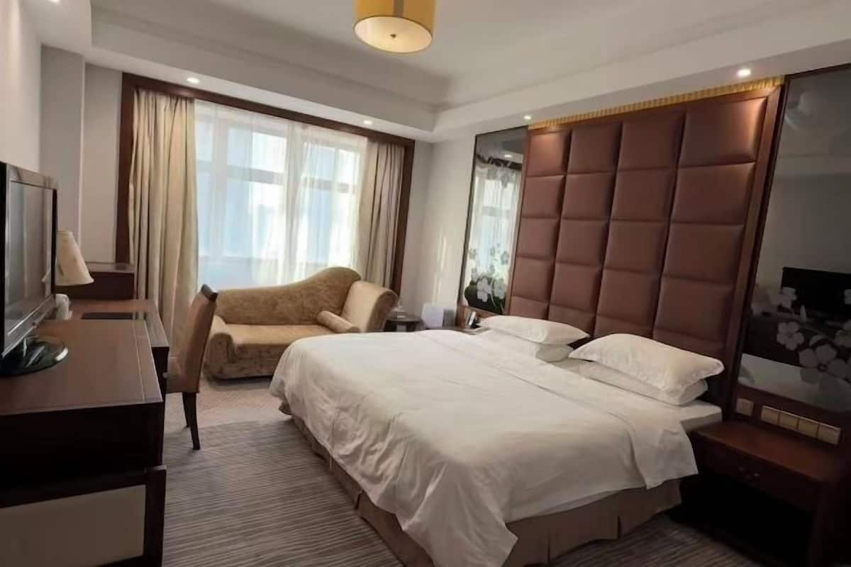 Minibar, desk, blackout drapes, iron/ironing board