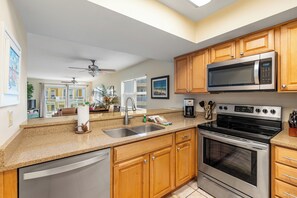 Coffee/tea maker, fridge, microwave, oven