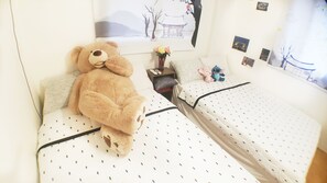 Habitació amb dos llits individuals | Planxa i posts de planxar i wifi gratuïta 