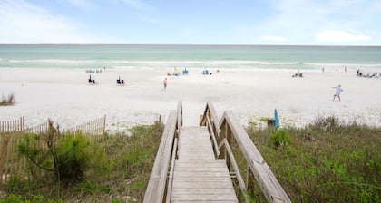 Perfect Beach Getaway!!  2 BR 2 BA Ground floor End Unit!! Steps From The Beach!