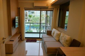 Habitación familiar | Área de sala de estar | Televisión de pantalla plana 