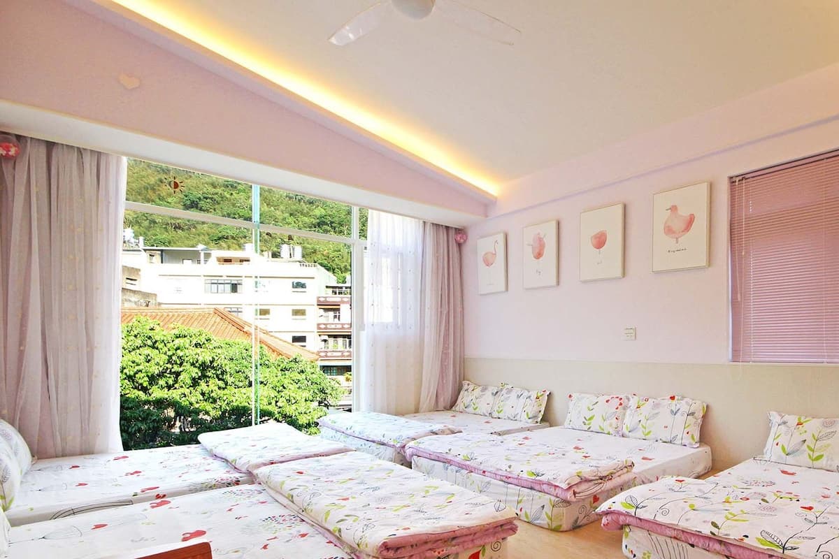 Comfort Room (10-Person) | Blackout drapes, soundproofing, rollaway beds (surcharge), WiFi (free)