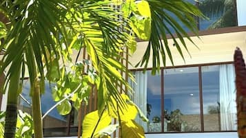 Deluxe Room | 1 bedroom, premium bedding, in-room safe, individually decorated