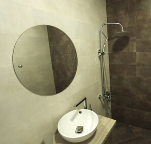 Shower, free toiletries, hair dryer, bathrobes