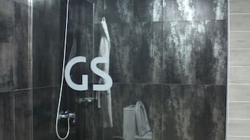 Deluxe Double Room, 1 Bedroom | Bathroom | Shower, free toiletries, hair dryer, slippers
