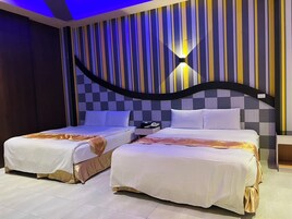 Business Quadruple Room | 1 bedroom, premium bedding, desk, blackout drapes