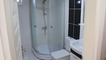 Shower, free toiletries, hair dryer, slippers