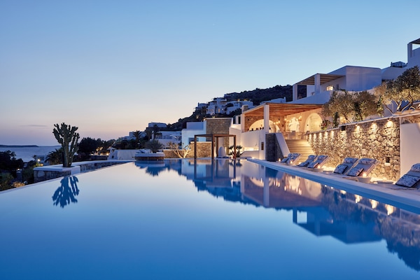 2 outdoor pools, pool umbrellas, sun loungers