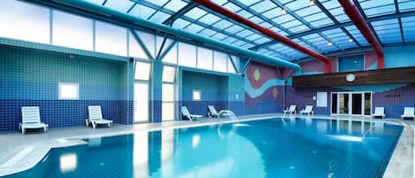 Indoor pool, outdoor pool, pool umbrellas, sun loungers