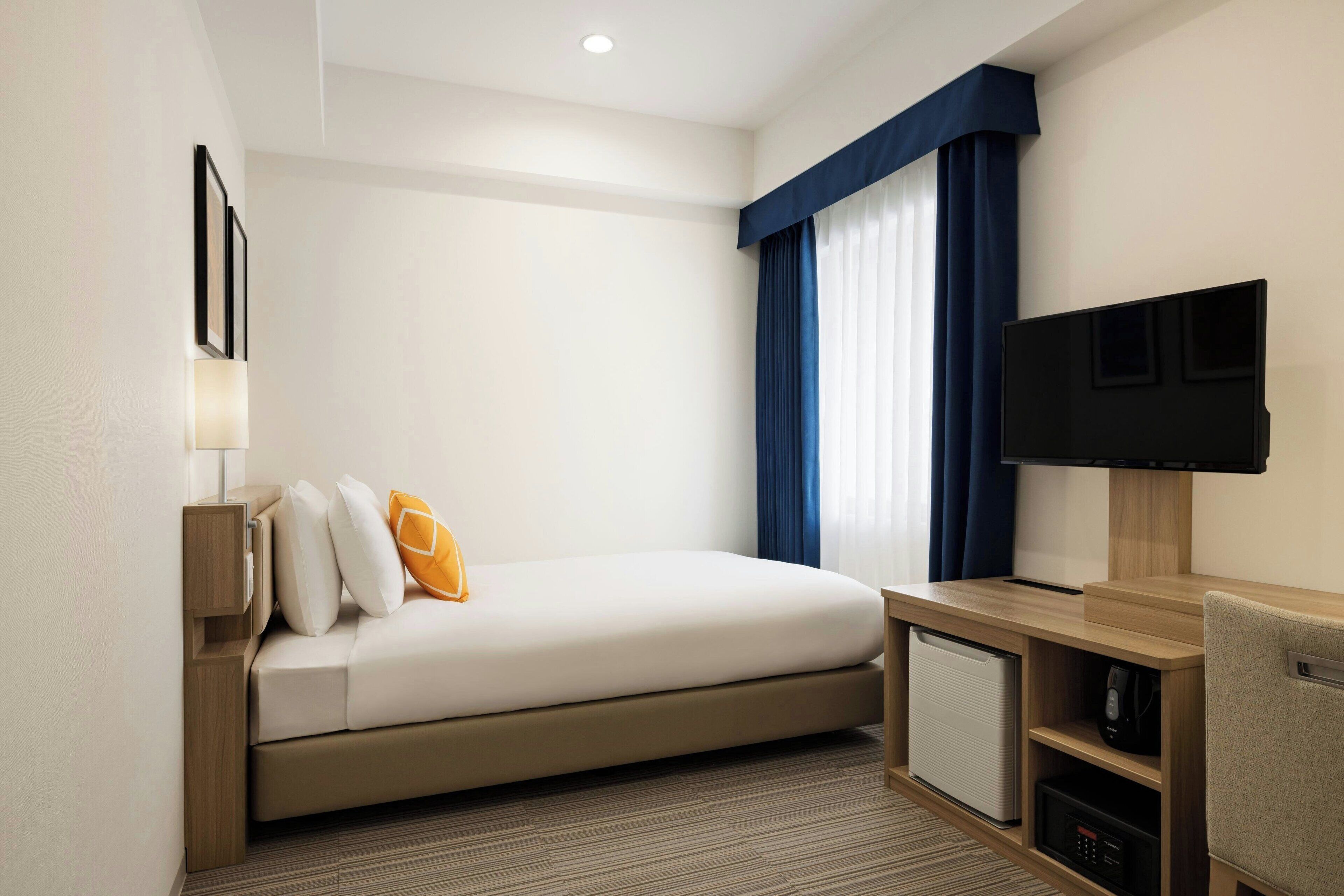 desk, laptop workspace, blackout curtains, free wifi