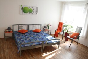 Desk, blackout curtains, iron/ironing board, rollaway beds