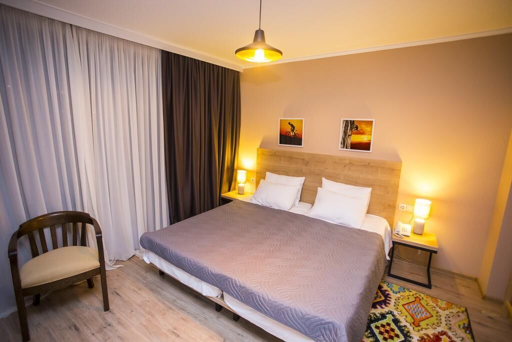 comfort suite, terrace | living area | flat-screen tv