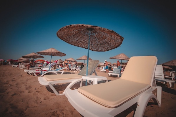 Private beach nearby, sun-loungers, beach umbrellas