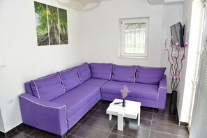Televisión de pantalla plana, piso con calefacción