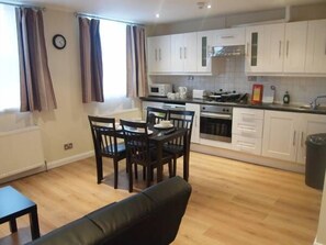 Apartment, 1 Bedroom (First Floor) | Private kitchen | Fridge, microwave, oven, stovetop