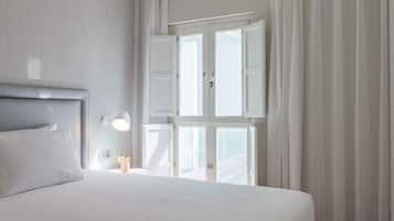 Copriletto in piuma, una cassaforte in camera, tende oscuranti