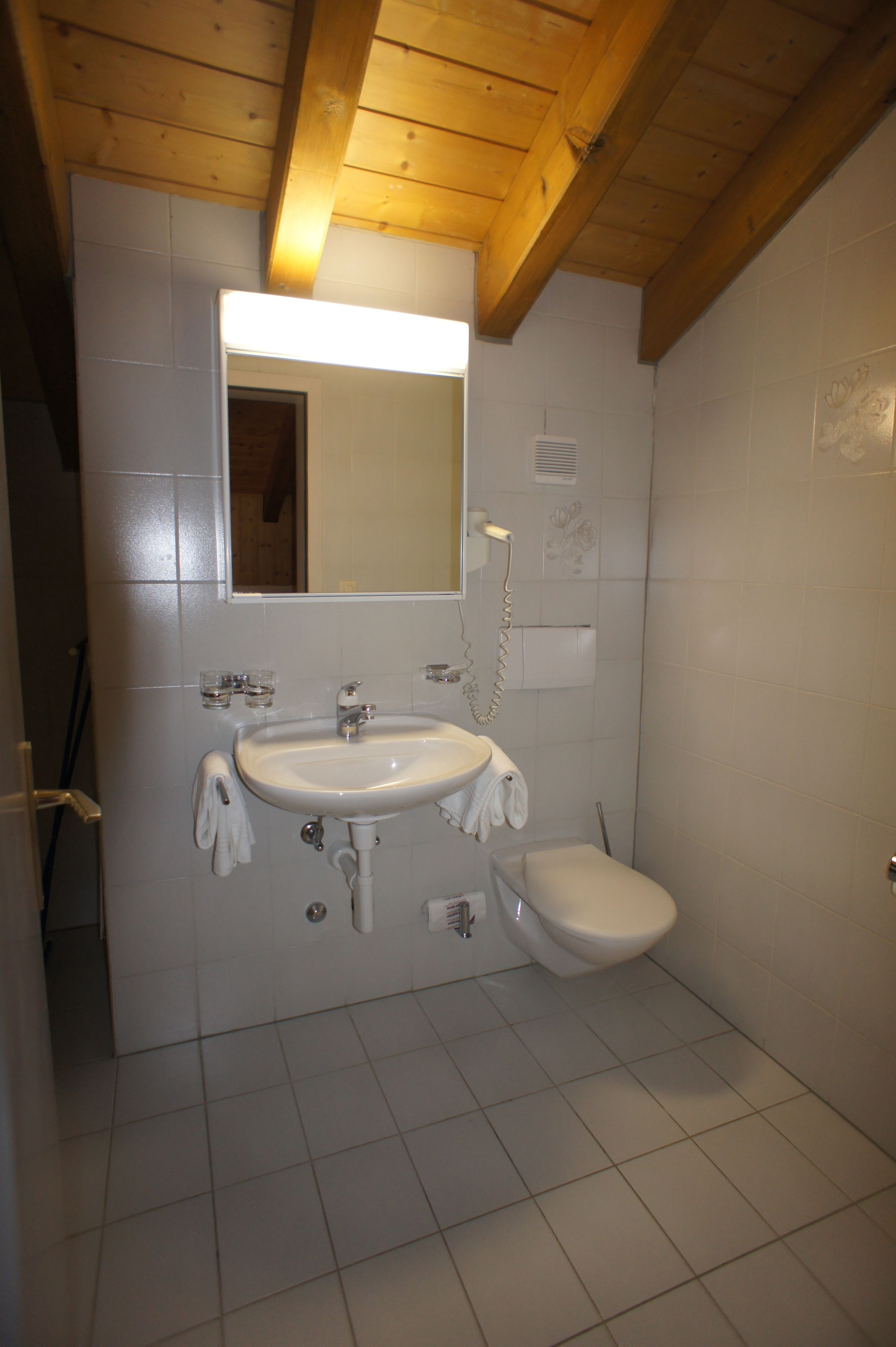 deluxe quadruple room, mountain view | bathroom | shower, hair dryer, towels, soap