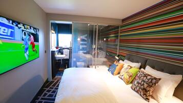 Club Room (FREE Gym & Pool Access) | Desk, laptop workspace, blackout drapes, iron/ironing board