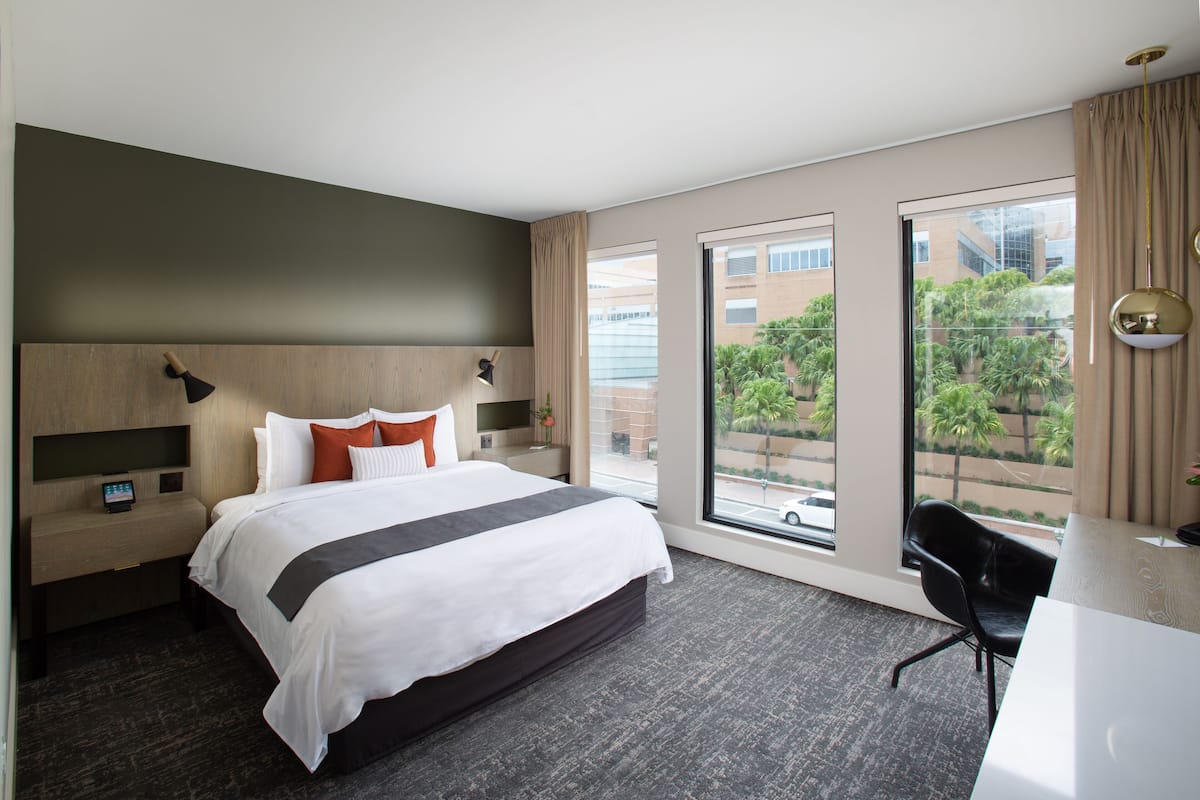 Plush Deluxe King | 1 bedroom, premium bedding, in-room safe, desk