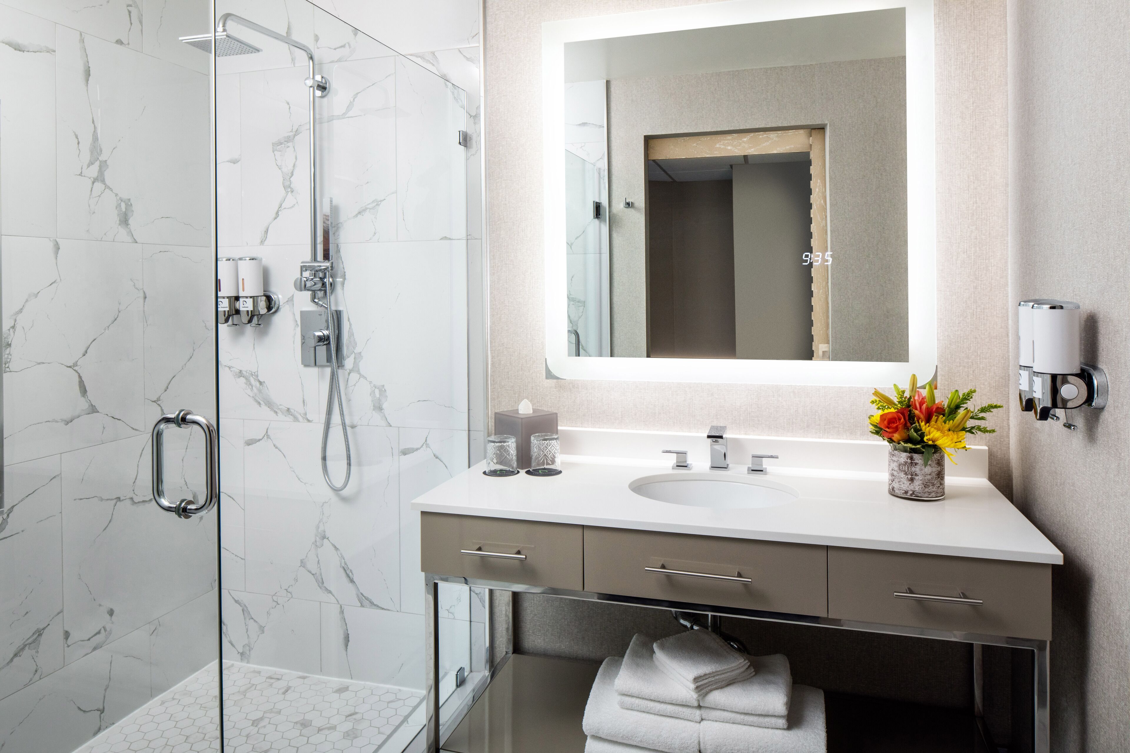 shower, free toiletries, hair dryer, towels