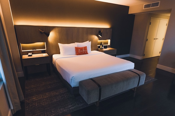 Plush Deluxe King | 1 bedroom, premium bedding, in-room safe, desk