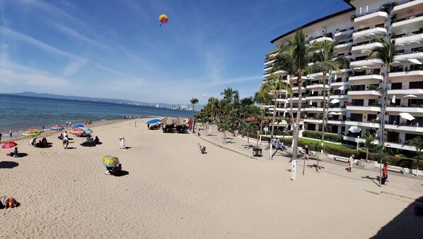 On the beach, sun loungers, beach towels