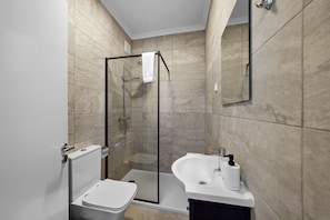 Apartment, 1 Bedroom | Bathroom | Shower, hair dryer, towels, soap