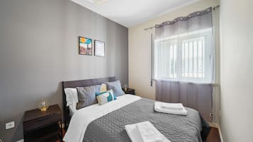 Appartement, 1 slaapkamer | 1 slaapkamer, een strijkplank/strijkijzer, gratis wifi, beddengoed