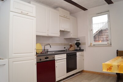 Top floor apartment with 3 bedrooms in a listed half-timbered house in 1837