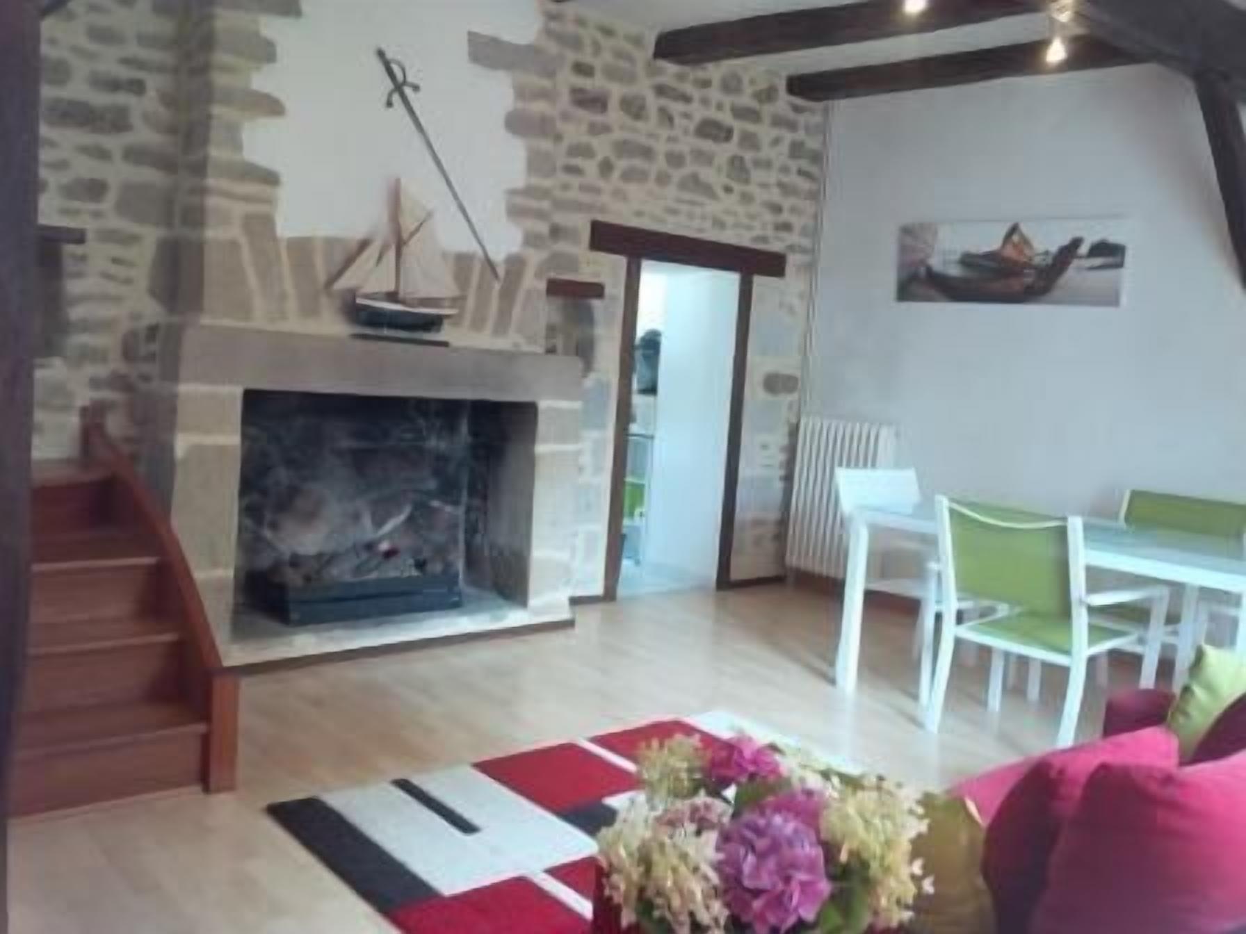 TV, fireplace, books, stereo