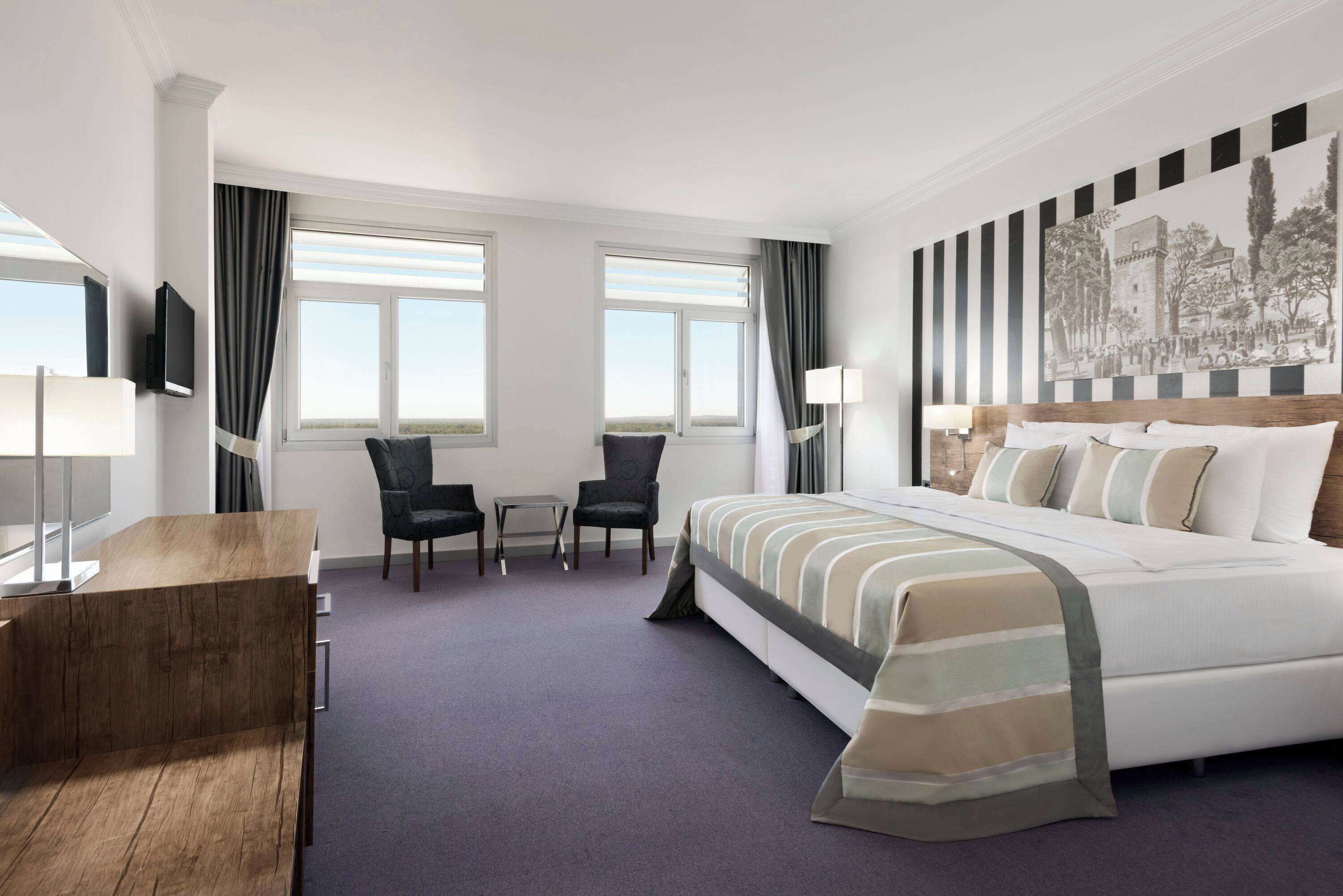 Premium bedding, down comforters, memory foam beds, minibar