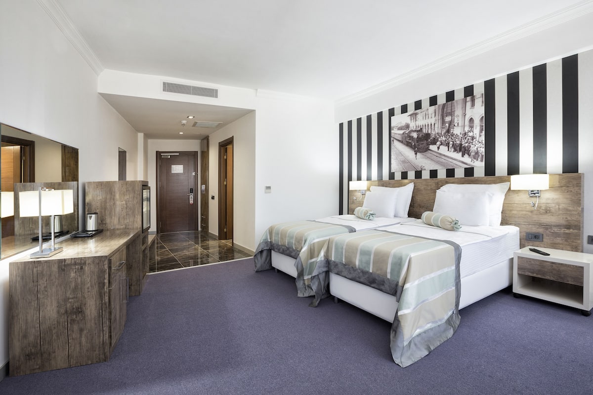 Premium bedding, down duvets, memory-foam beds, minibar