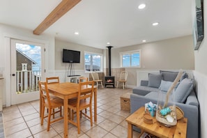 Smart TV, fireplace, DVD player, books