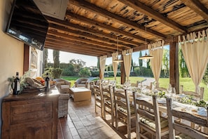 Enjoy dining al fresco amidst lush gardens and beautifully set tables.