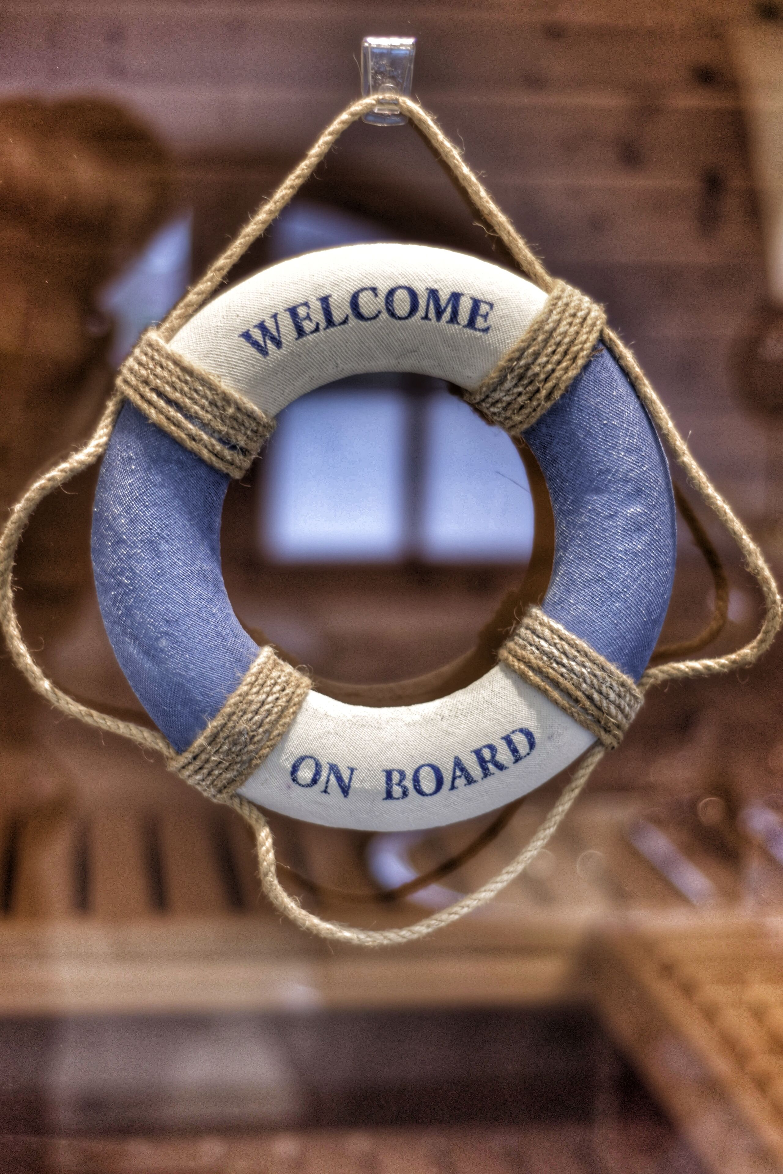 A lifebuoy with "WELCOME ON BOARD" text.