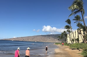 On the beach, sun loungers, beach towels
