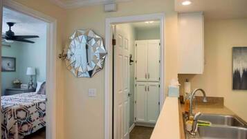 1 bedroom, desk, iron/ironing board, travel crib