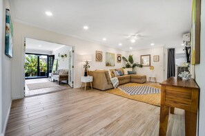 Smart TV, fireplace, books, video library