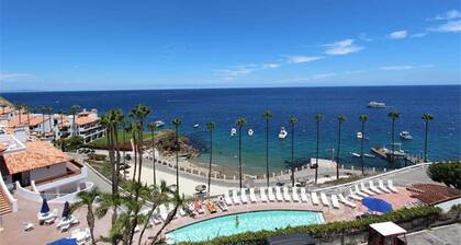 MAGNIFICENT OCEAN VIEW Hamilton Cove Condo With Golf Cart Included.