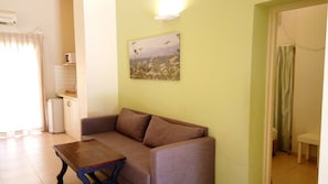Apartment, 1 Bedroom | Living area - Kibbutz Tiratzvi - Country Lodging (Emek HaMaayanot)